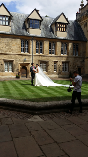 oxford_bride_and_groom_on_lawn.png